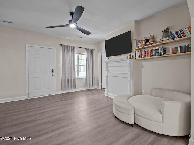 579 Hubert Blvd, Hubert, NC 28539 - living area with wood finished floors and ceiling fan