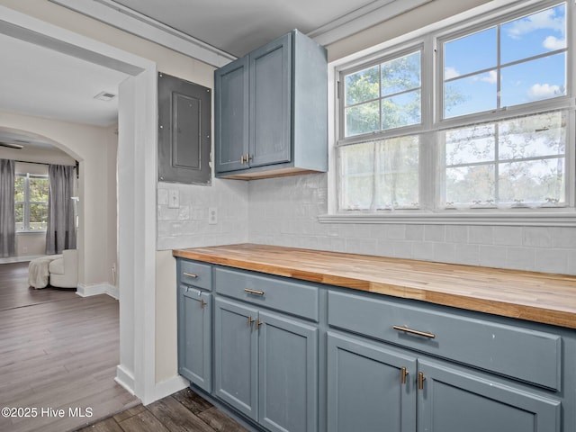 579 Hubert Blvd, Hubert, NC 28539 - kitchen with butcher block countertops, electric panel, and tasteful backsplash