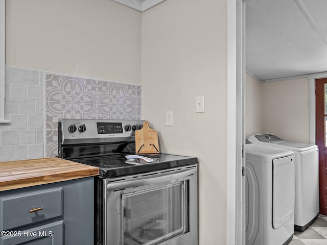 579 Hubert Blvd, Hubert, NC 28539 - kitchen with stainless steel range with electric cooktop, butcher block counters, independent washer and dryer, gray cabinets, and backsplash