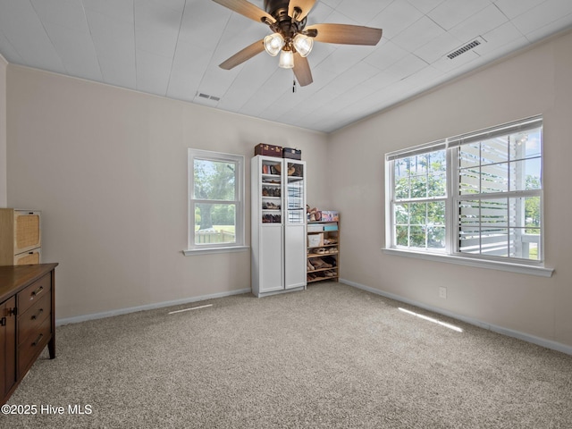 579 Hubert Blvd, Hubert, NC 28539 - carpeted empty room with baseboards and a ceiling fan