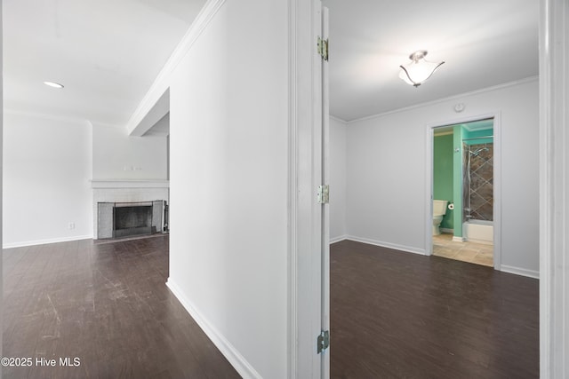 907 Woodruff Ave, Elizabeth City, NC 27909 - corridor featuring wood finished floors and crown molding