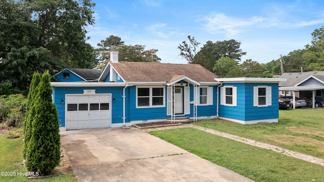907 Woodruff Ave, Elizabeth City, NC 27909 - single story home with a garage, a front yard, concrete driveway, and a chimney