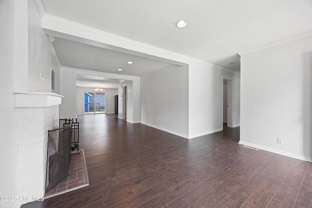 907 Woodruff Ave, Elizabeth City, NC 27909 - unfurnished living room featuring ornamental molding, a chandelier, hardwood / wood-style flooring, and recessed lighting