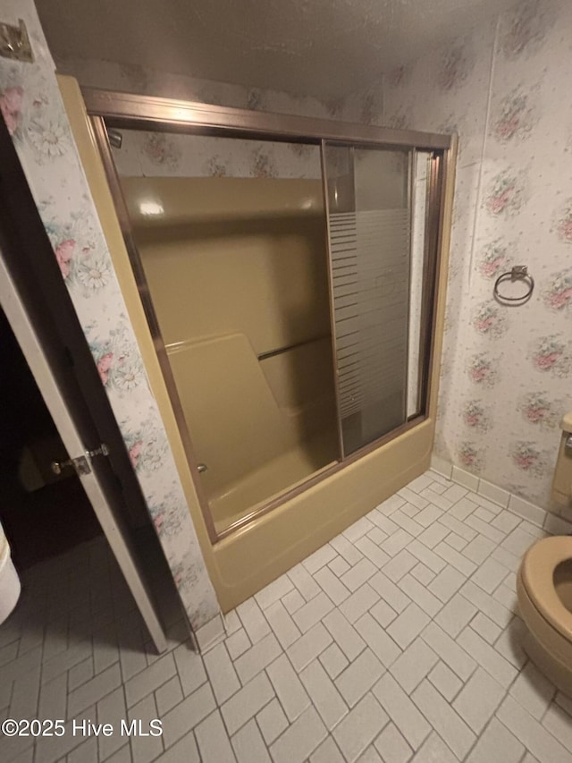 2440 Ocean Sound Cir SW, Supply, NC 28462 - bathroom featuring wallpapered walls and shower / bath combination with glass door