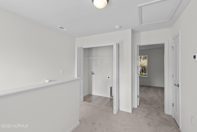 463 Sullivan Loop Rd, Midway Park, NC 28544 - unfurnished bedroom with light colored carpet, a closet, and attic access
