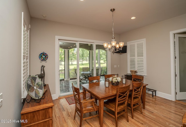 545 Gladstone Cir SW, Ocean Isle Beach, NC 28469 - dining area with a chandelier, light wood-style floors, and recessed lighting