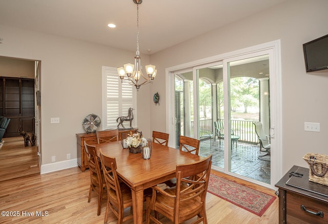 545 Gladstone Cir SW, Ocean Isle Beach, NC 28469 - dining area with light wood-type flooring, a chandelier, and recessed lighting