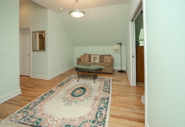 545 Gladstone Cir SW, Ocean Isle Beach, NC 28469 - living area featuring light wood-style floors and lofted ceiling