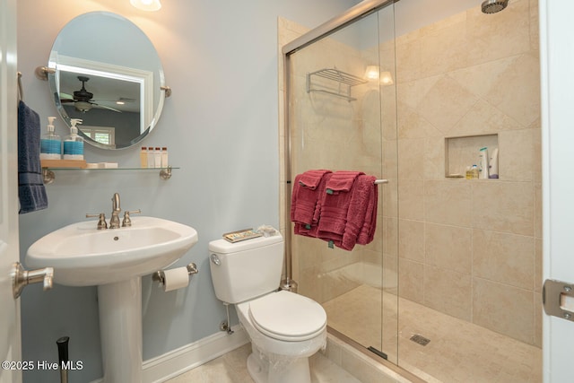 545 Gladstone Cir SW, Ocean Isle Beach, NC 28469 - bathroom with a stall shower and a ceiling fan