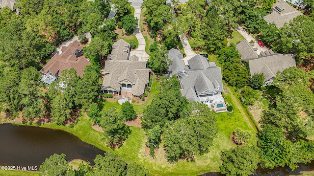 545 Gladstone Cir SW, Ocean Isle Beach, NC 28469 - aerial perspective of suburban area featuring a nearby body of water
