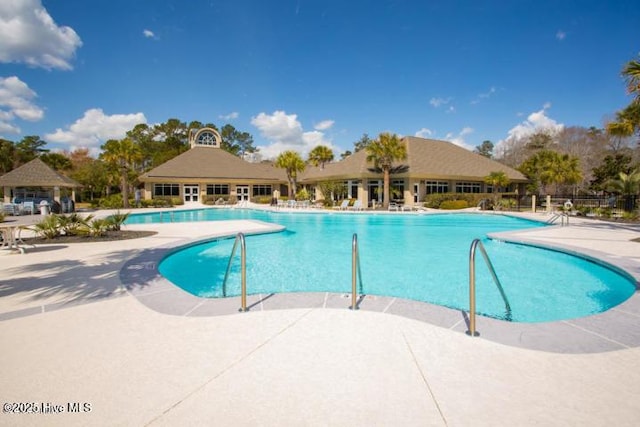 545 Gladstone Cir SW, Ocean Isle Beach, NC 28469 - community pool featuring a gazebo and a patio area