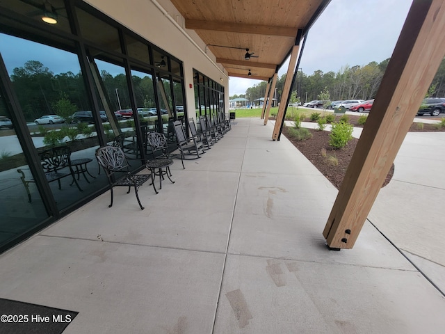 545 Gladstone Cir SW, Ocean Isle Beach, NC 28469 - view of patio with a ceiling fan
