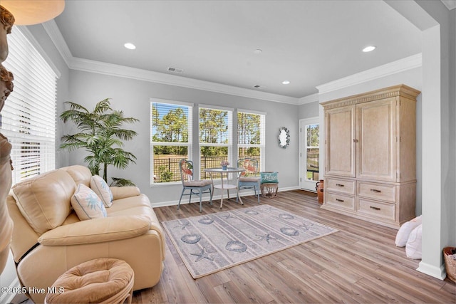 3236 Penzance Row, Wilmington, NC 28412 - living area featuring ornamental molding, light wood-type flooring, and recessed lighting