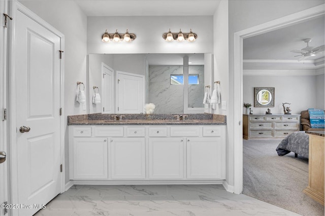 3236 Penzance Row, Wilmington, NC 28412 - ensuite bathroom with marble look tile flooring, double vanity, and ceiling fan