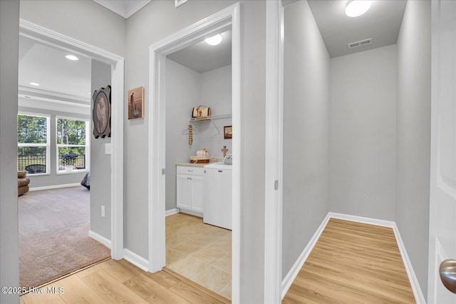 3236 Penzance Row, Wilmington, NC 28412 - corridor with washer / dryer, light wood-type flooring, and recessed lighting