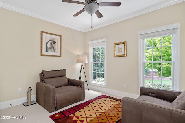 220 October Glory Dr, Wallace, NC 28466 - living area with ornamental molding, healthy amount of natural light, ceiling fan, and carpet floors