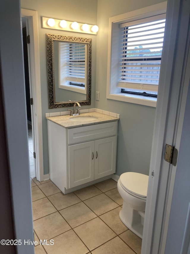 7417 Coker Ct, Wilmington, NC 28411 - half bathroom featuring tile patterned flooring and vanity