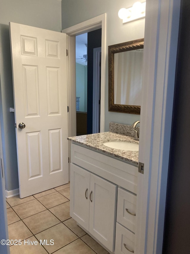 7417 Coker Ct, Wilmington, NC 28411 - bathroom with vanity, tile patterned flooring, and a ceiling fan