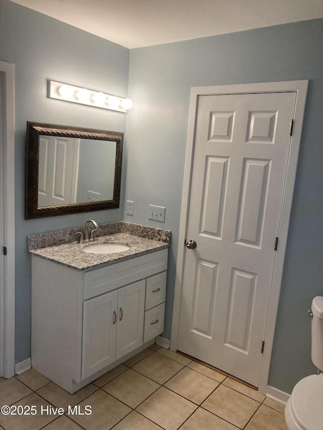 7417 Coker Ct, Wilmington, NC 28411 - bathroom with vanity and tile patterned floors