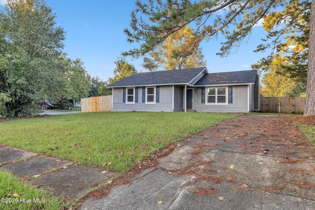 411 Cardinal Dr, Jacksonville, NC 28546 - ranch-style house with a shingled roof