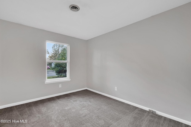 411 Cardinal Dr, Jacksonville, NC 28546 - unfurnished room featuring baseboards and dark colored carpet