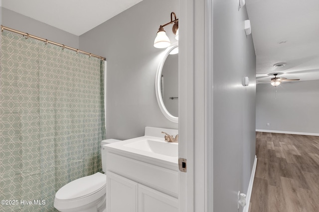 411 Cardinal Dr, Jacksonville, NC 28546 - bathroom featuring vanity, ceiling fan, wood finished floors, and a shower with curtain