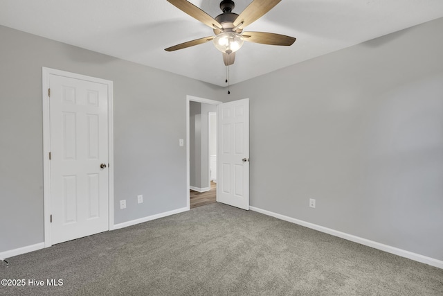 411 Cardinal Dr, Jacksonville, NC 28546 - unfurnished bedroom featuring carpet and ceiling fan