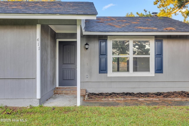 411 Cardinal Dr, Jacksonville, NC 28546 - property entrance with roof with shingles