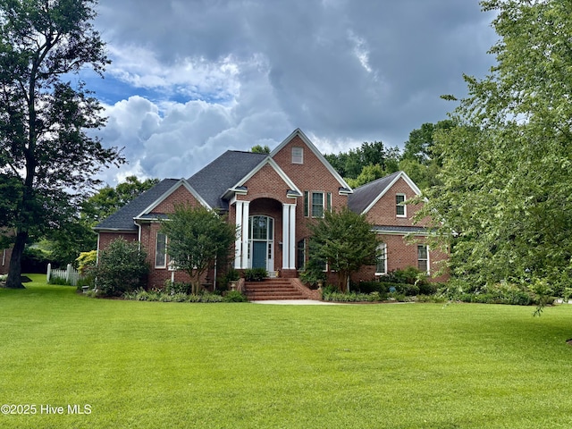 1009 Colleton Way, New Bern, NC 28562 - view of front facade with a front lawn and brick siding
