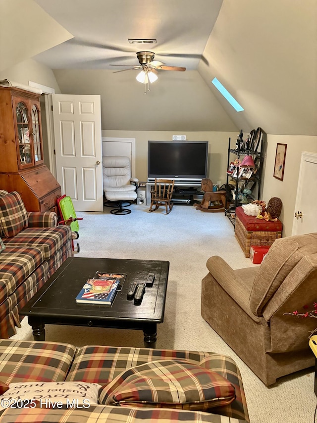 1009 Colleton Way, New Bern, NC 28562 - living room with carpet, vaulted ceiling, ceiling fan, and a skylight