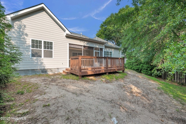 707 Liberty Landing Way, Wilmington, NC 28409 - rear view of house featuring a deck and a sunroom