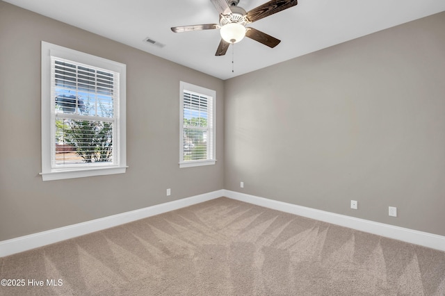 707 Liberty Landing Way, Wilmington, NC 28409 - carpeted empty room featuring baseboards and ceiling fan