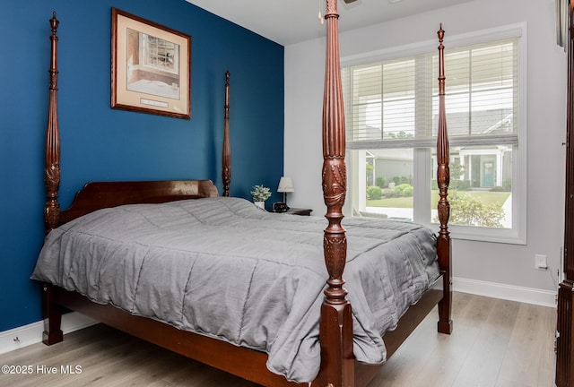 440 Bramble Ln, Clayton, NC 27527 - bedroom featuring wood finished floors and baseboards