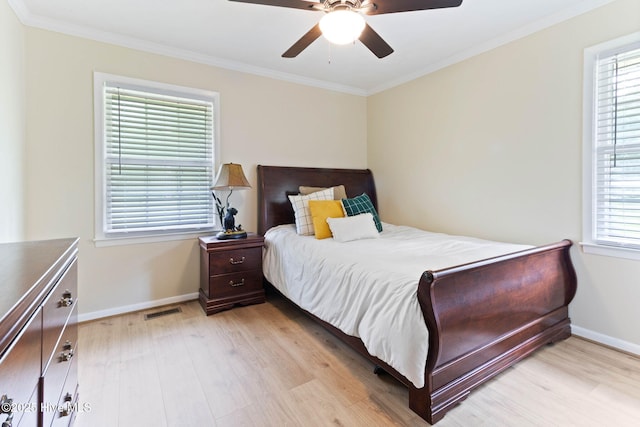 84 White Pine Rd, Lake Waccamaw, NC 28450 - bedroom featuring light wood-style flooring, ornamental molding, and a ceiling fan