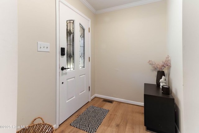84 White Pine Rd, Lake Waccamaw, NC 28450 - entryway with ornamental molding and light wood-type flooring