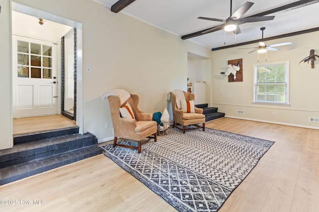 84 White Pine Rd, Lake Waccamaw, NC 28450 - living area with wood finished floors, a ceiling fan, and crown molding