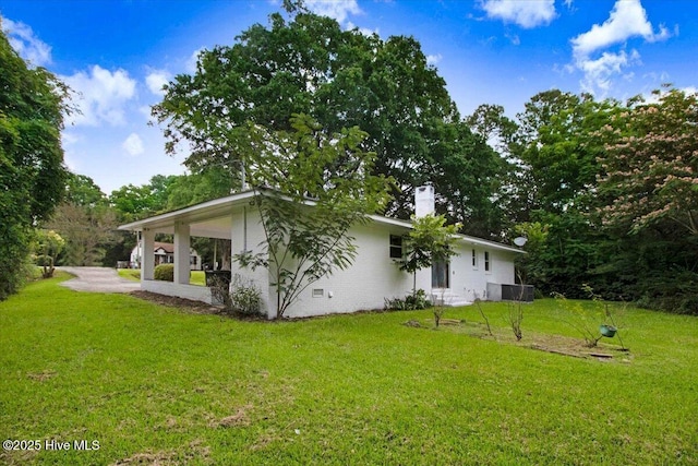 527 W College St, Warsaw, NC 28398 - back of house with a lawn