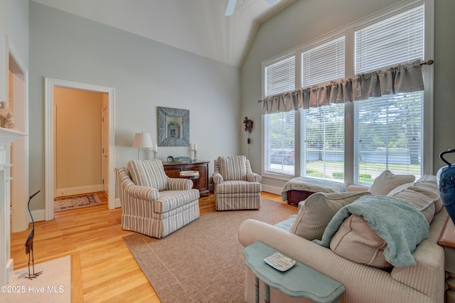 4929 Lake Renaissance Cir, Wilmington, NC 28409 - living area with wood finished floors, ceiling fan, and high vaulted ceiling