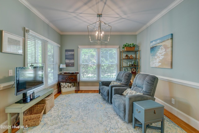 4929 Lake Renaissance Cir, Wilmington, NC 28409 - living area featuring wood finished floors, a chandelier, and ornamental molding
