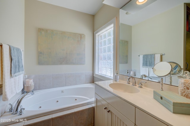 4929 Lake Renaissance Cir, Wilmington, NC 28409 - full bath featuring a jetted tub and vanity
