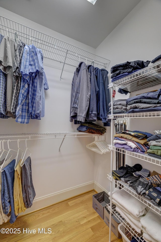 4929 Lake Renaissance Cir, Wilmington, NC 28409 - spacious closet featuring wood finished floors