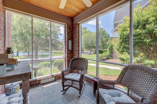 4929 Lake Renaissance Cir, Wilmington, NC 28409 - sunroom with a water view, a ceiling fan, and healthy amount of natural light
