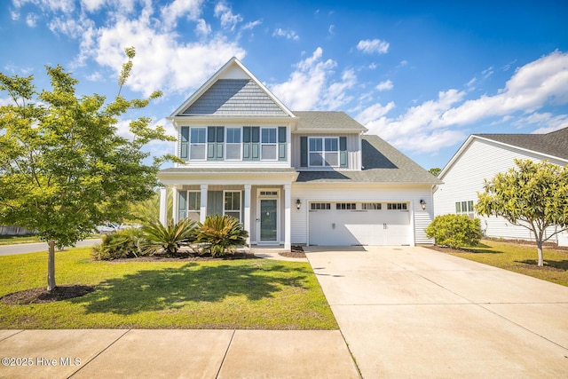 368 Lehigh Rd, Wilmington, NC 28412 - view of front of house featuring driveway, a front yard, and roof with shingles