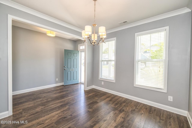 368 Lehigh Rd, Wilmington, NC 28412 - spare room with a chandelier, dark wood-style flooring, and crown molding