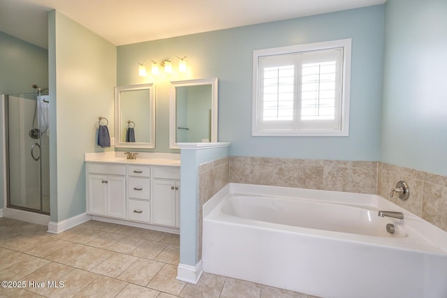 368 Lehigh Rd, Wilmington, NC 28412 - bathroom with vanity, a bath, tile patterned floors, and a stall shower