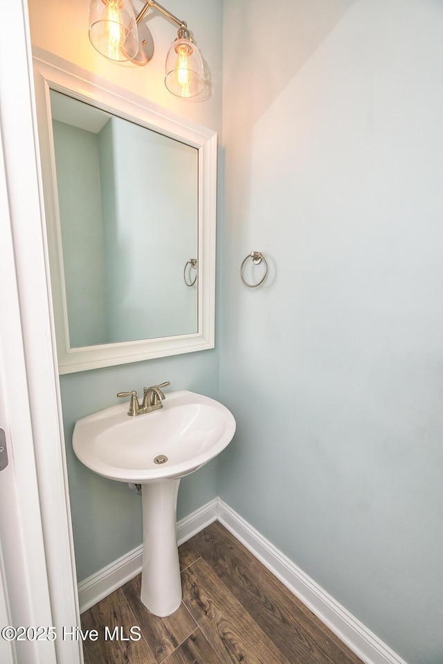 368 Lehigh Rd, Wilmington, NC 28412 - bathroom featuring wood finished floors and baseboards