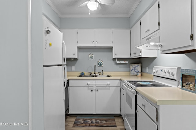 1004 Carolina Beach Ave S Unit A4, Carolina Beach, NC 28428 - kitchen with white appliances, under cabinet range hood, a textured ceiling, crown molding, and ceiling fan