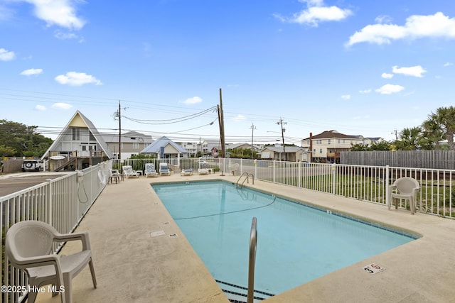 1004 Carolina Beach Ave S Unit A4, Carolina Beach, NC 28428 - community pool featuring a patio area and a residential view