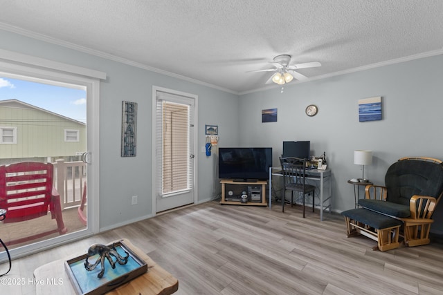 1004 Carolina Beach Ave S Unit A4, Carolina Beach, NC 28428 - living room with a ceiling fan, wood finished floors, ornamental molding, and a textured ceiling