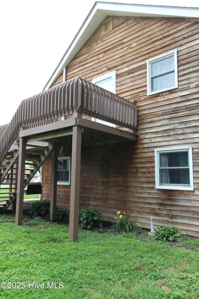 507 Seaview Dr, Edenton, NC 27932 - view of side of home featuring stairway, a yard, and a deck